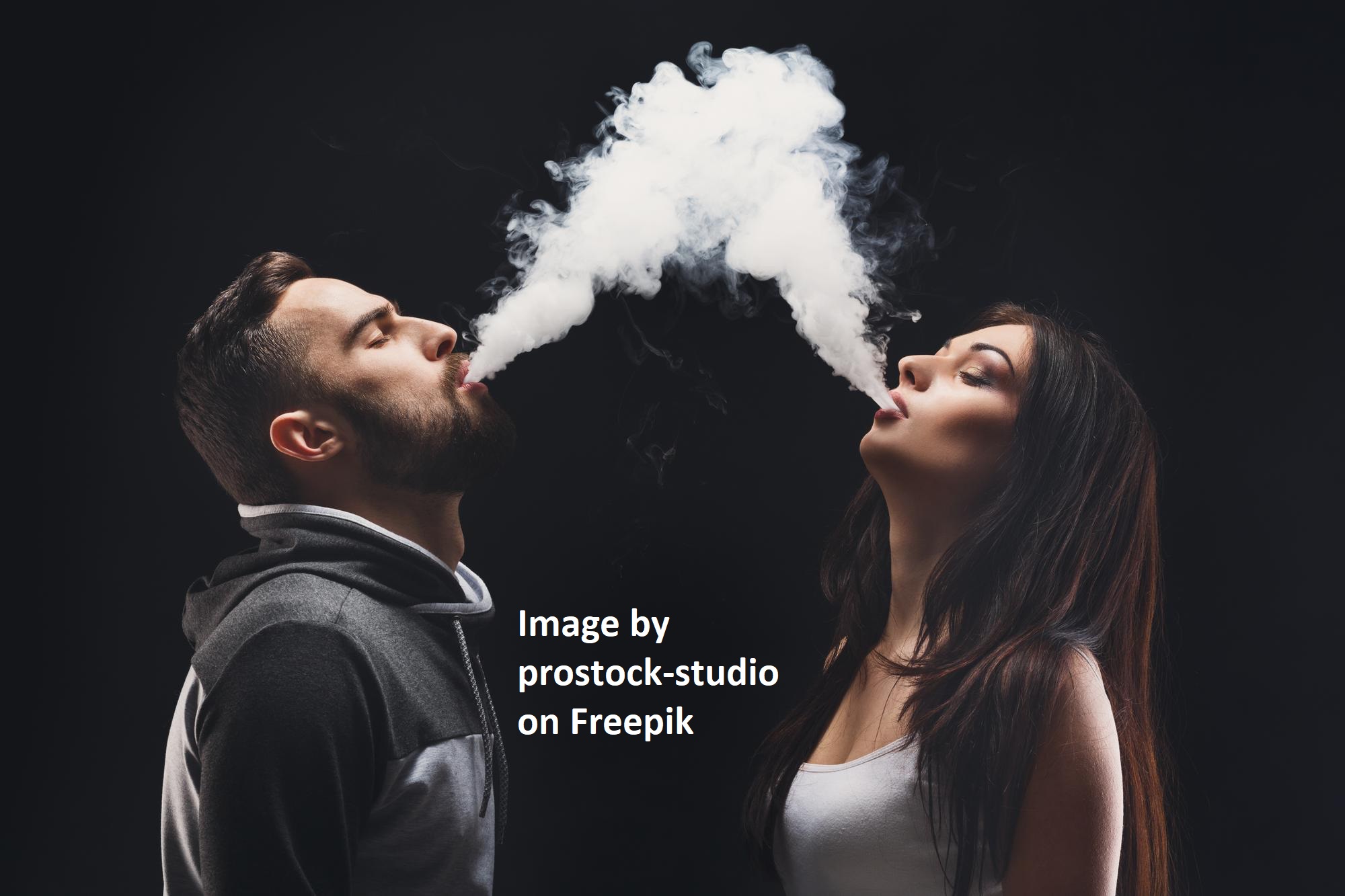 Couple blowing smoke (prostock-studio on Freepik)